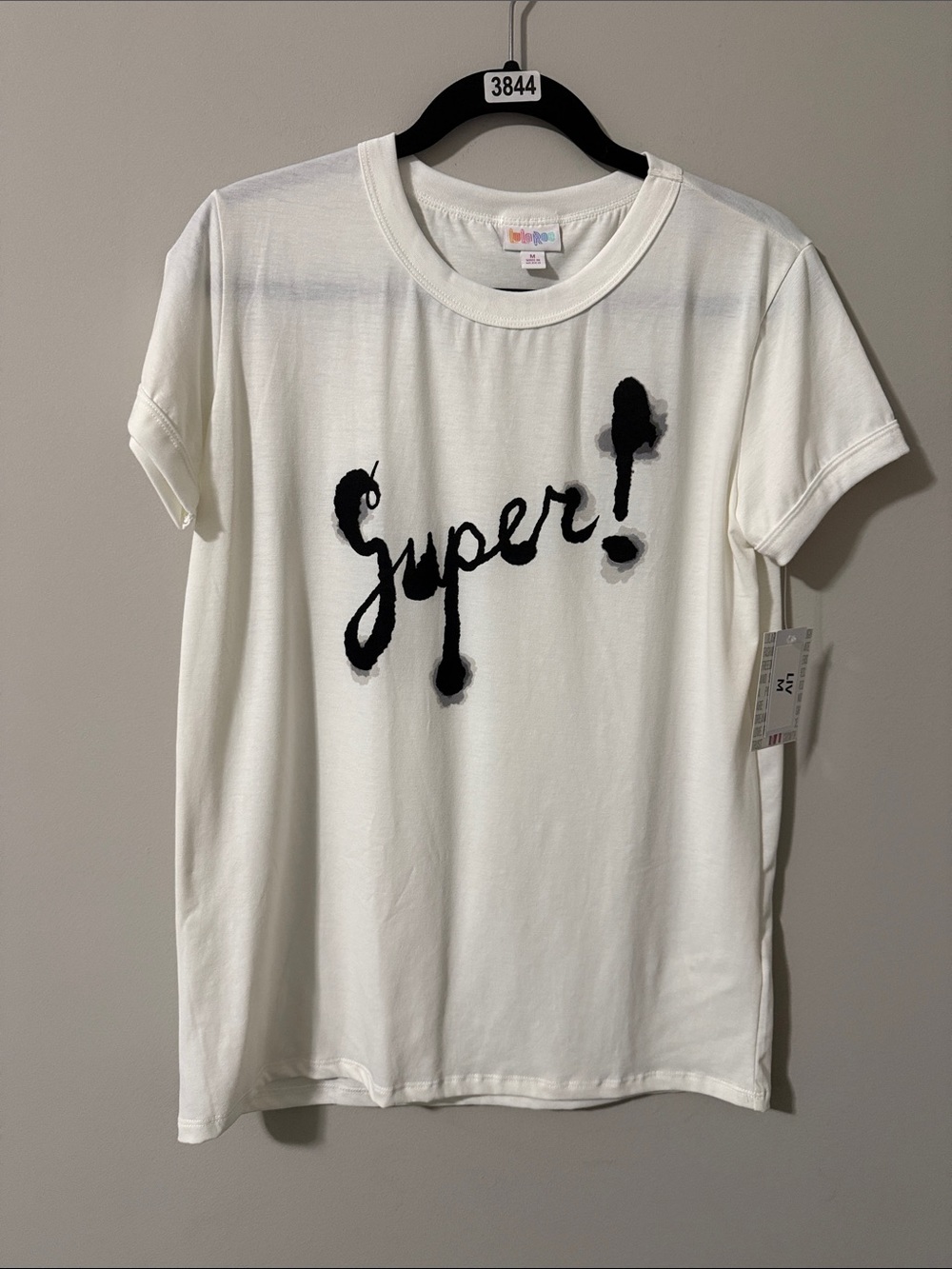 LuLaRoe White Tee with Black 'Super!' Script